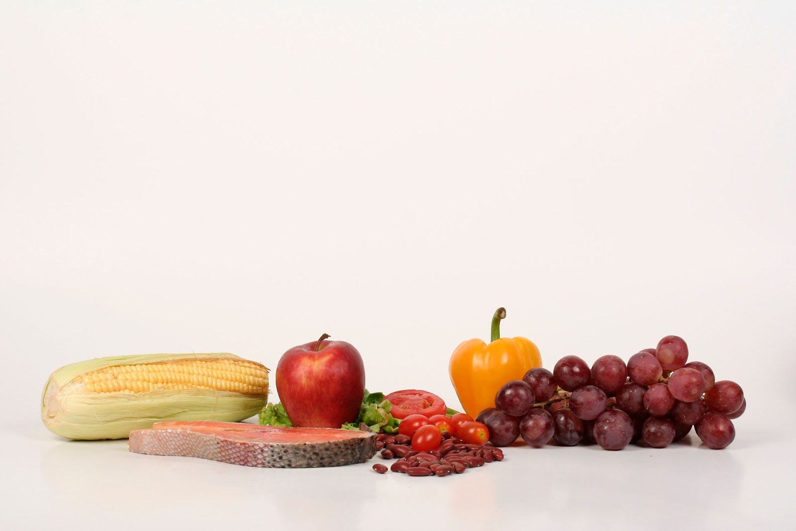 Colorful whole foods including fruits and vegetables for a balanced healthy diet