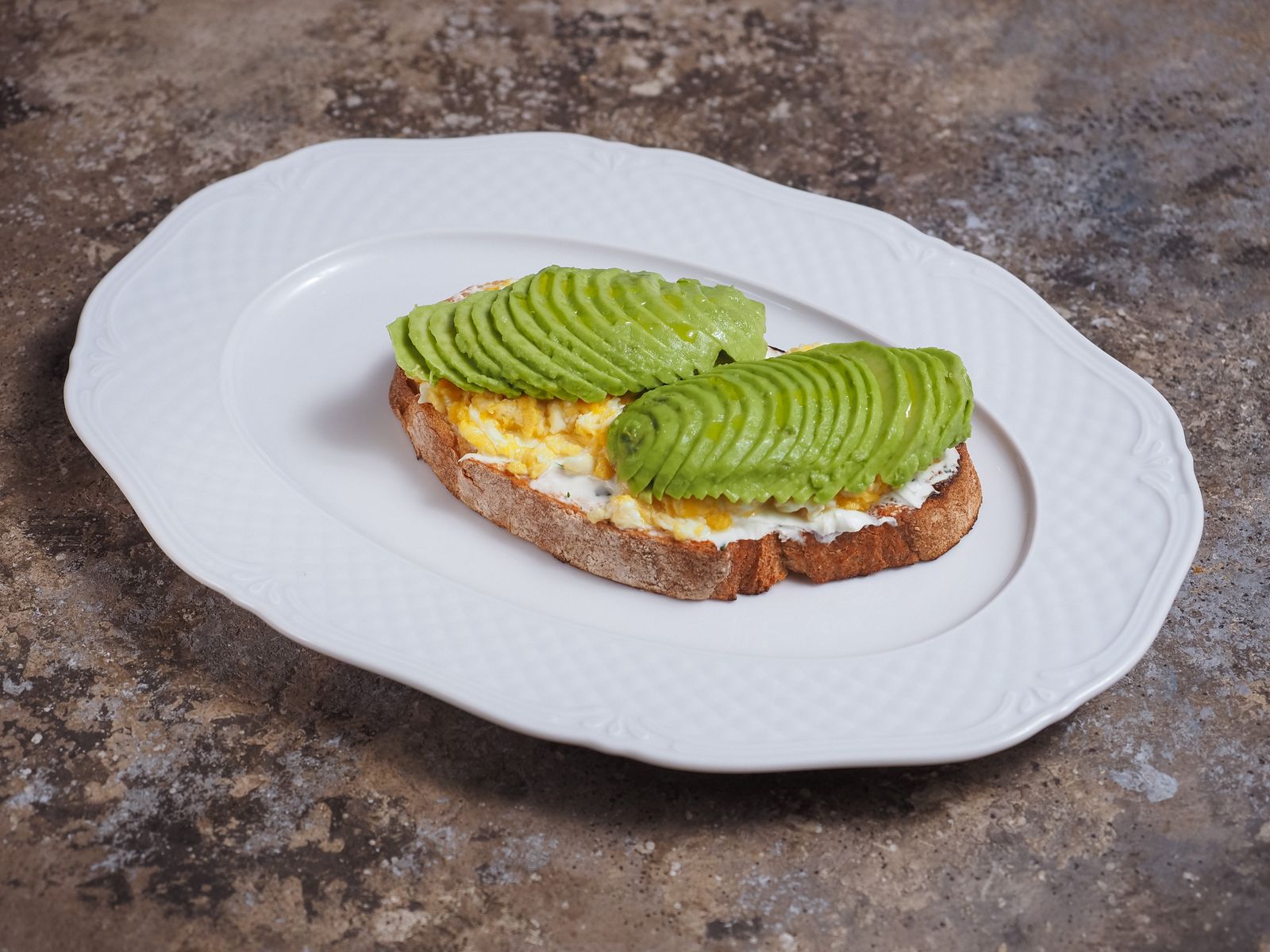 Fresh avocado providing monounsaturated fats, fiber and potassium