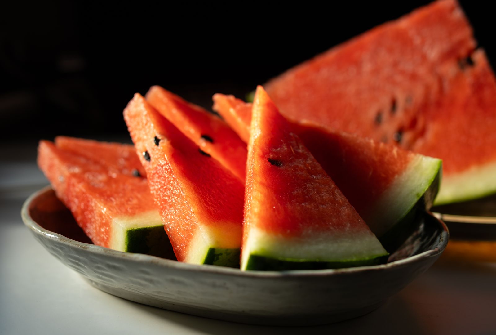 Fresh watermelon slices providing hydration and naturally occurring citrulline